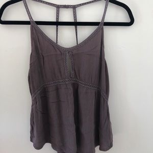 Two tank tops one roxy the other patrons of piece